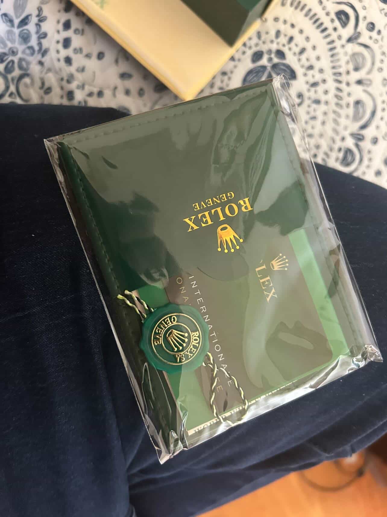 Rolex with paper and box