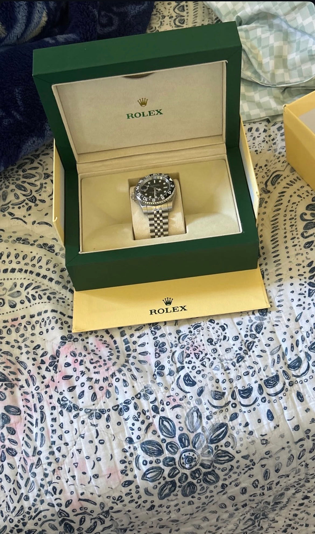 Rolex with paper and box